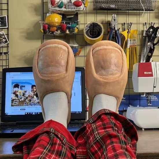 Funny big toe slippers; goofy big toe slippers